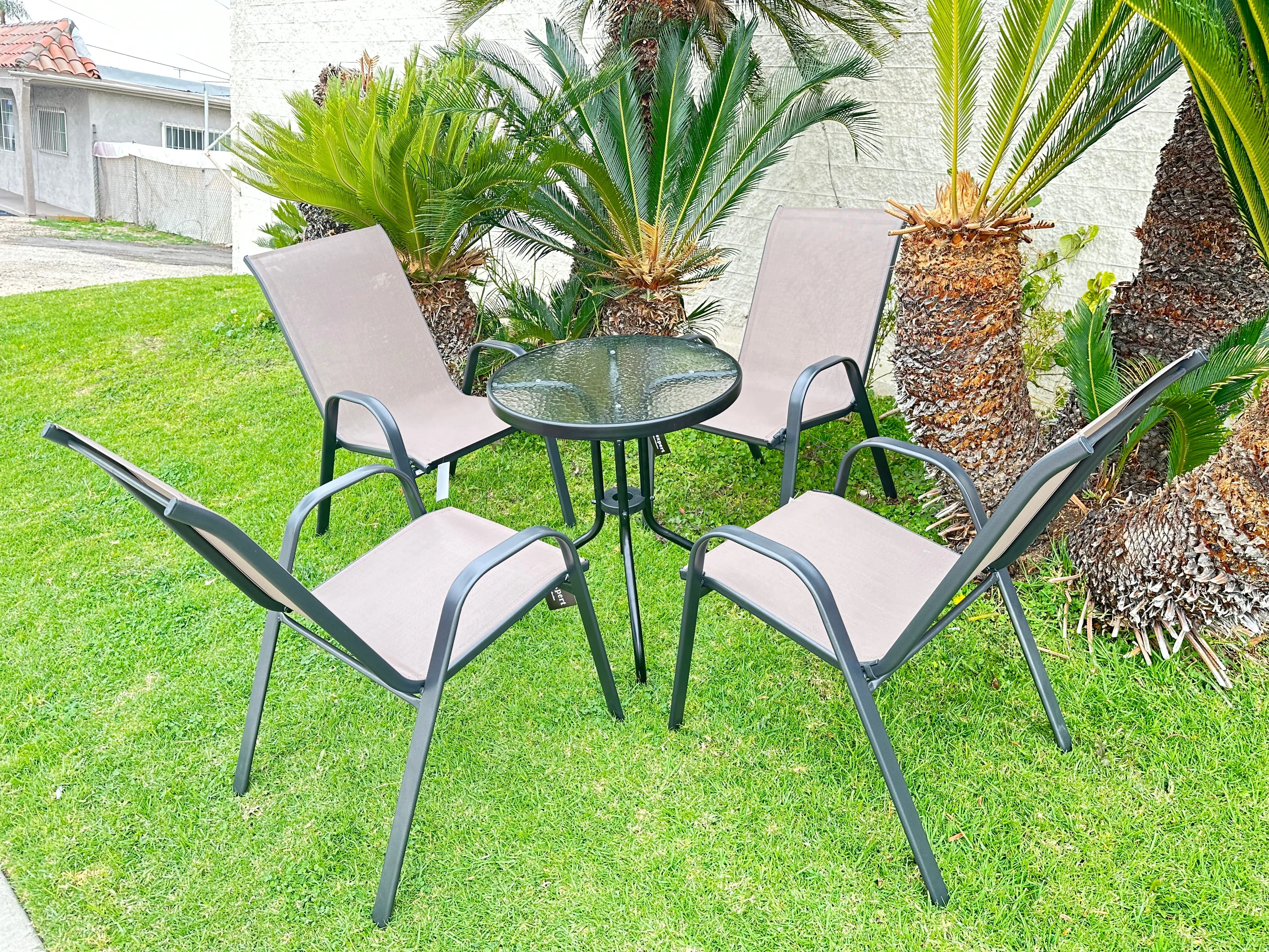 BTExpert Indoor Outdoor 23.75" Round Tempered Glass Metal Table   4 Brown Flexible Sling Stack Chairs Commercial Lightweight