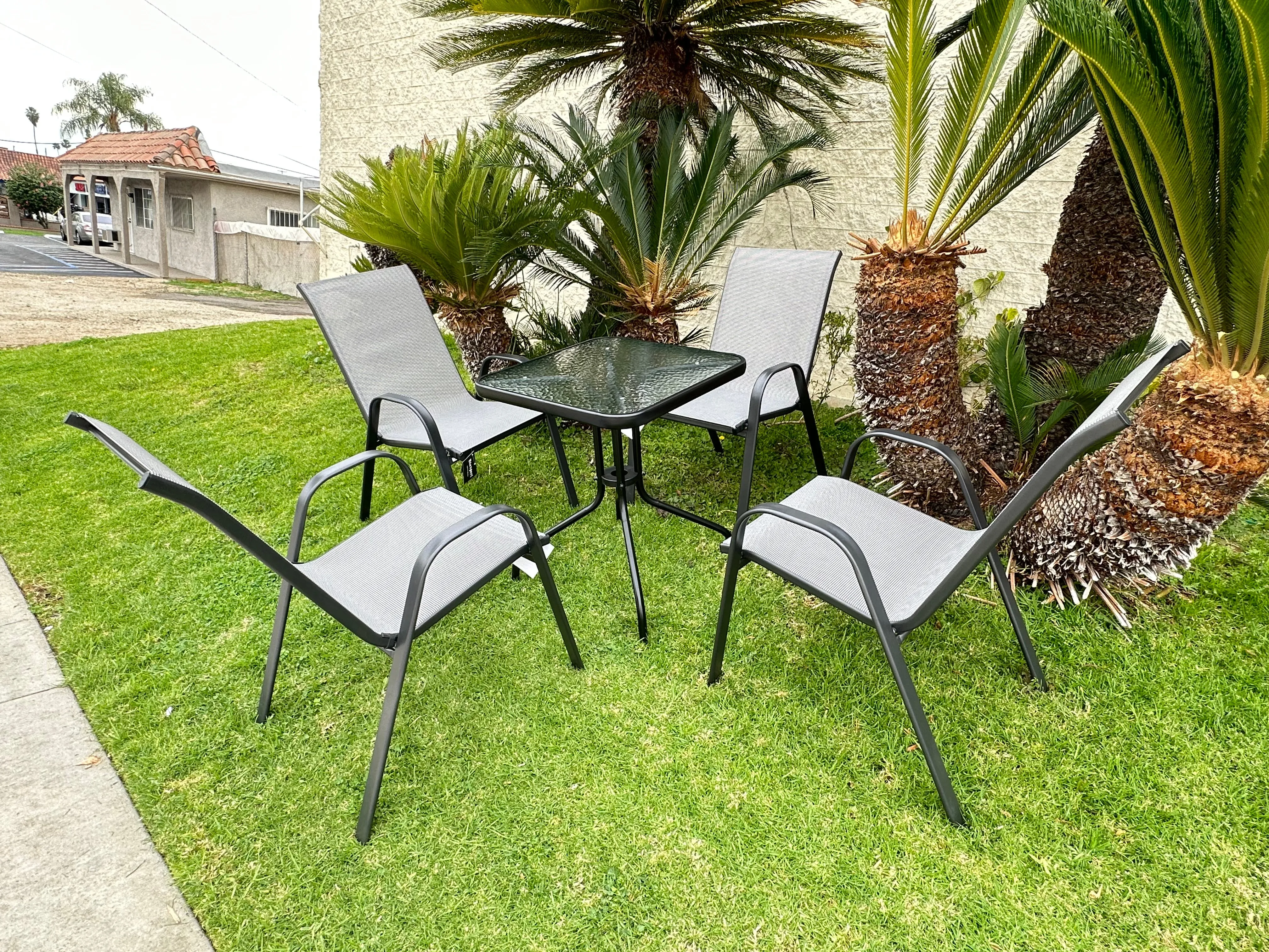 BTExpert Indoor Outdoor 23.75" Square Tempered Glass Metal Table   4 Gray Flexible Sling Stack Chairs Commercial Lightweight