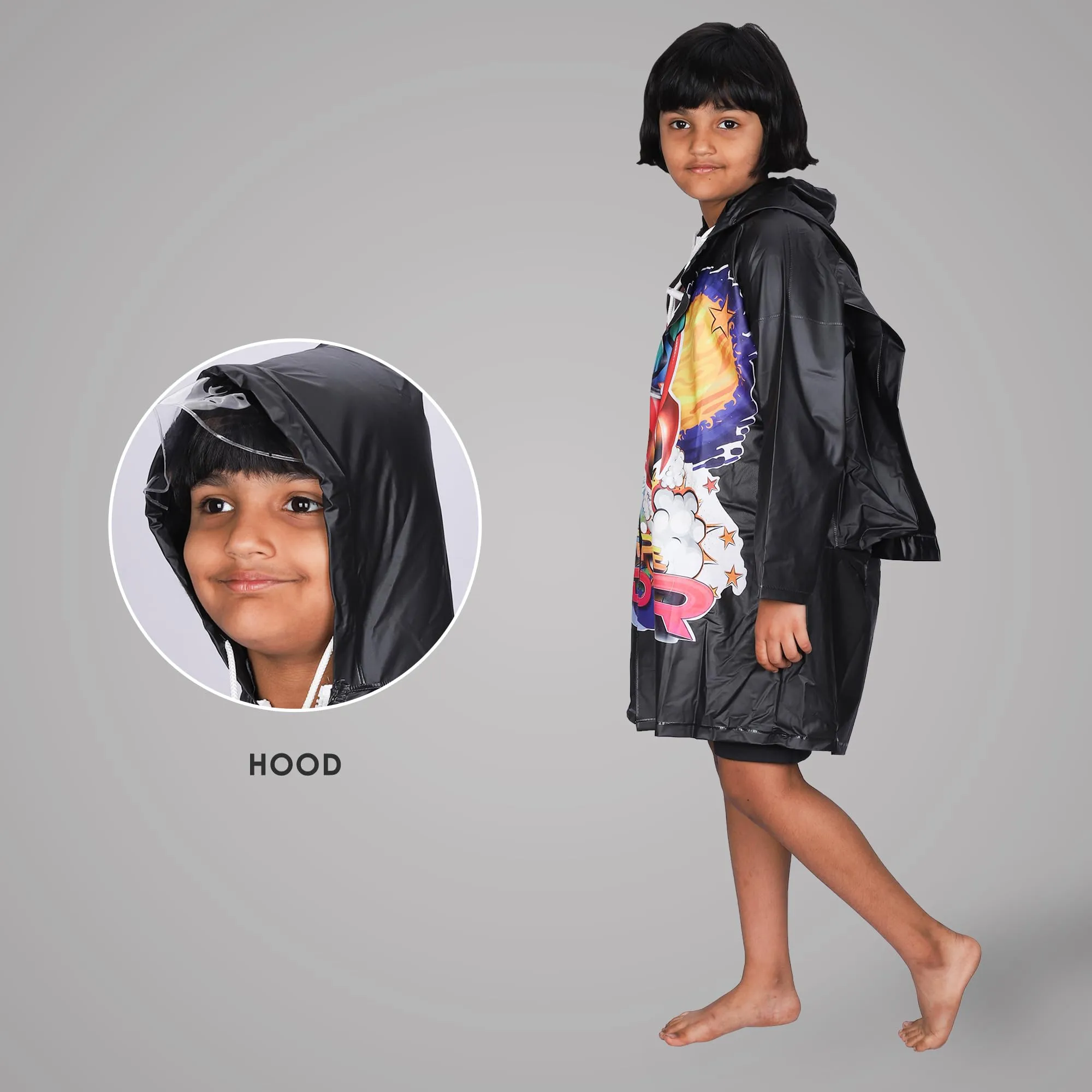 THE CLOWNFISH Toon Caper Series Kids Waterproof PVC Longcoat with Adjustable Hood & Extra Space for Backpack/Schoolbag Holding. Printed Plastic Pouch. Kid Age-3-4 years (Black)