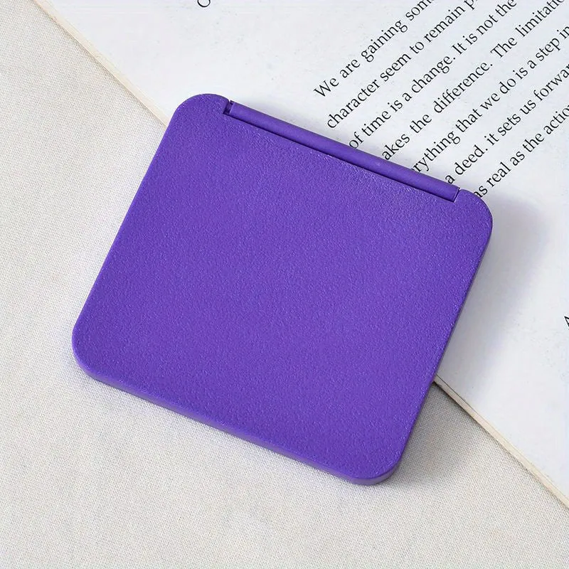 Travelfriendly doublesided folding compact mirror perfect for touchups