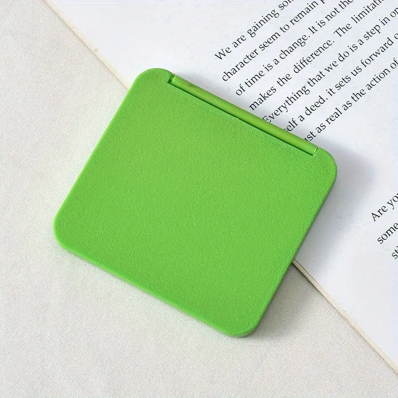 Travelfriendly doublesided folding compact mirror perfect for touchups