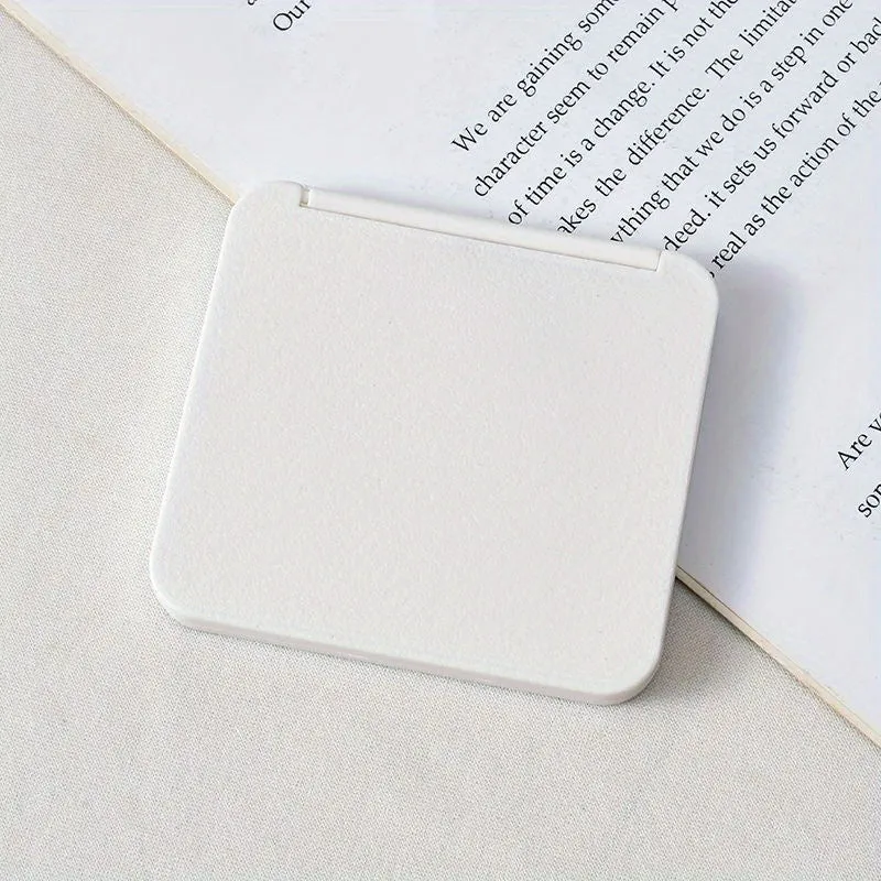 Travelfriendly doublesided folding compact mirror perfect for touchups